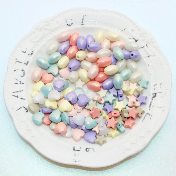 20pcs/pack Pearlescent Macaron Color Acrylic Beads Star Heart Oval Shaped Mixed Colors Loose Spacer Beads for DIY Jewelry Making Accessories DIY Bracelet Necklace Chain Earrings Charm Bangle Decors Craft Pen Supplies